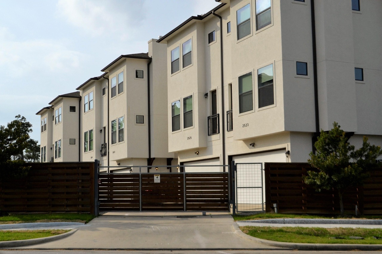 real-estate, for rent, rented, driveway, gated community, duplex, residential, architecture, outdoors, house, facade, building, window, street, pavement, daylight, sky, exterior, apartment, town, home, estate, real, modern, property, design, housing, structure, residence, set, collection, townhouse, rental, nature, brown, fence, gate, grass, mowed, lawn, occupied, occupy, investment, people, real life, brokerage, dwelling, affordable, low income housing, middle class, lower class, first apartment, hotel, townhouse check point, houston, texas, check-point, rent, business, on post, security, guard, guard house, security post, post, alert, ready, safety, gates, lock-down, locked, closed, firm, real estate, street side, entrance, enter, development, apartment complex, houston texas, town house, red, black gate, gated, secured, security gate
